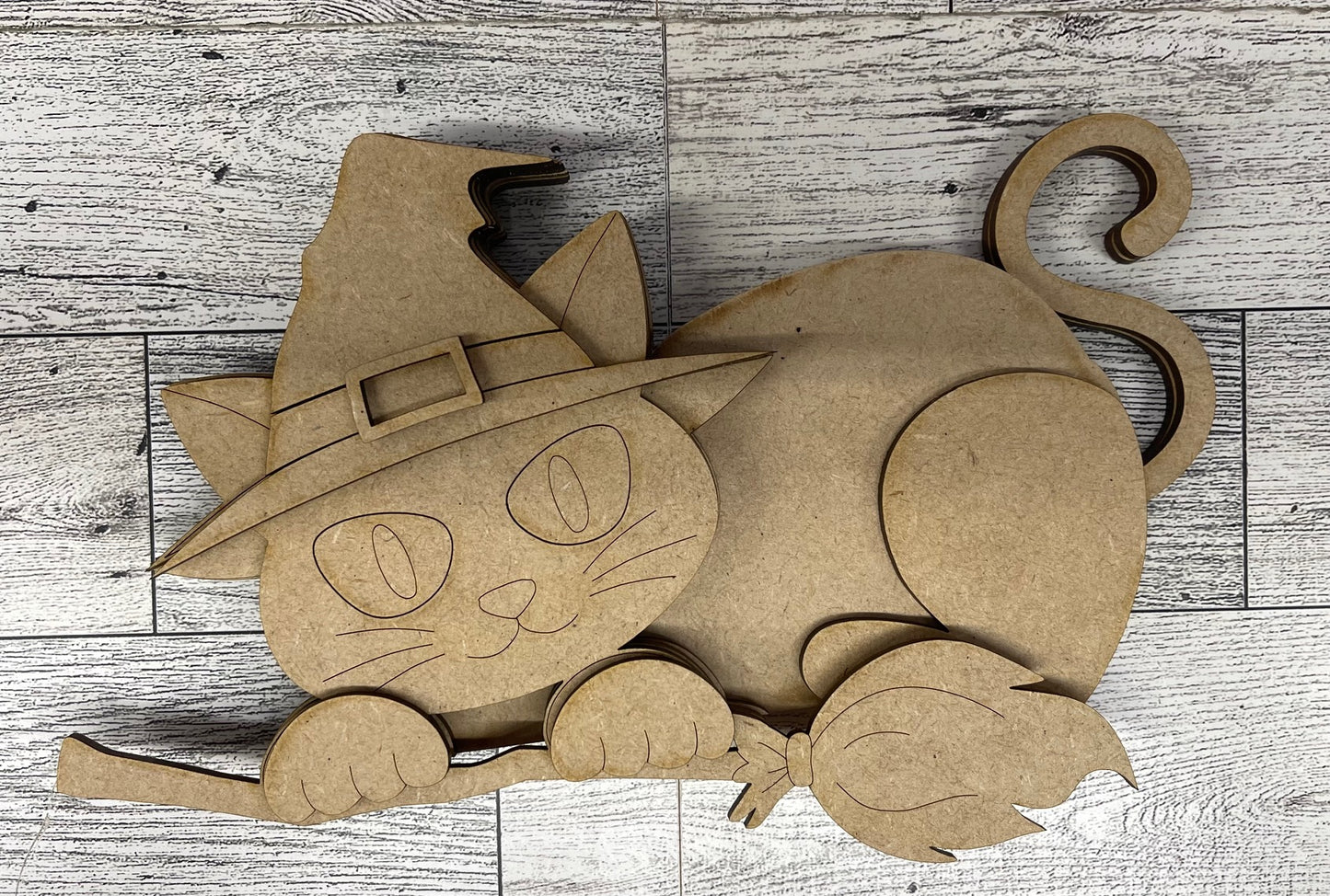 Large Halloween Cat Shelf Sitters hanging over shelf - unpainted wooden cutouts, ready for you to paint