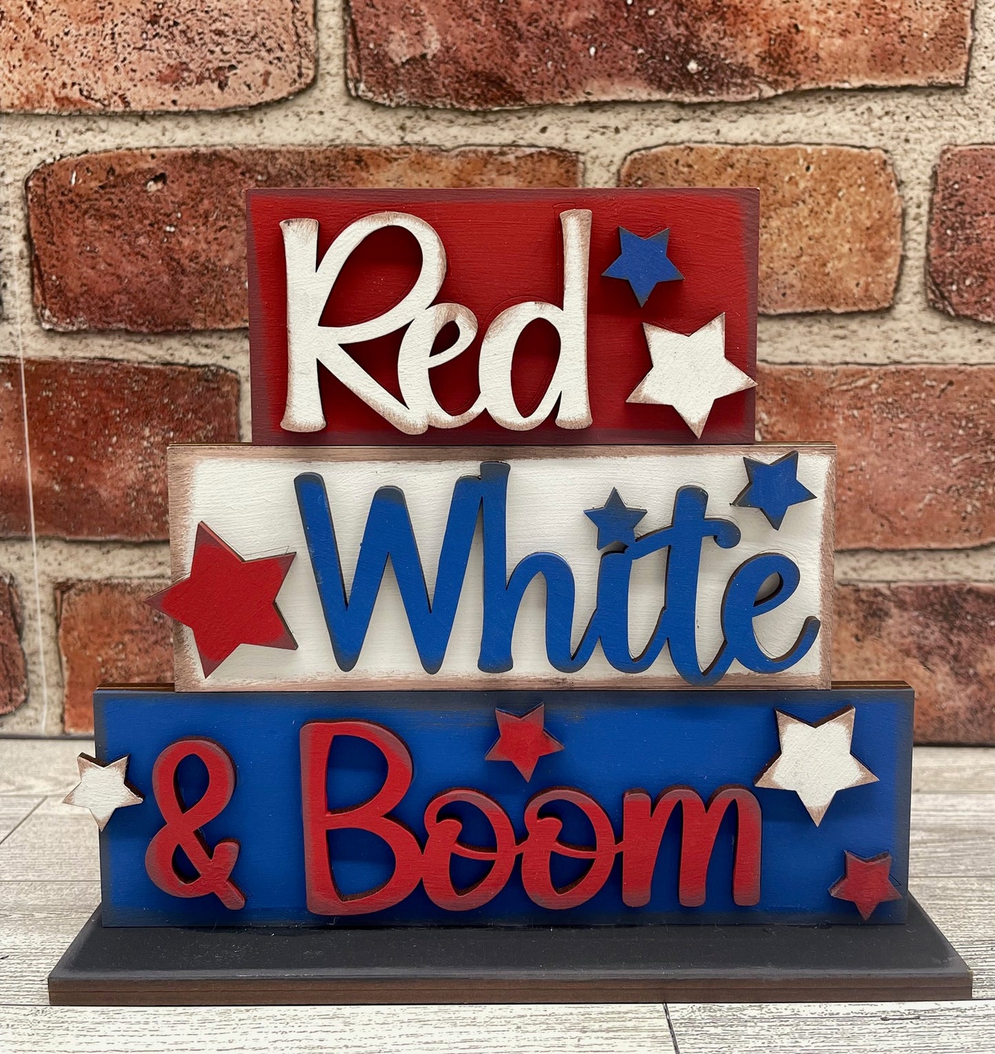 Painted Red, Whited & Boom Word Stander