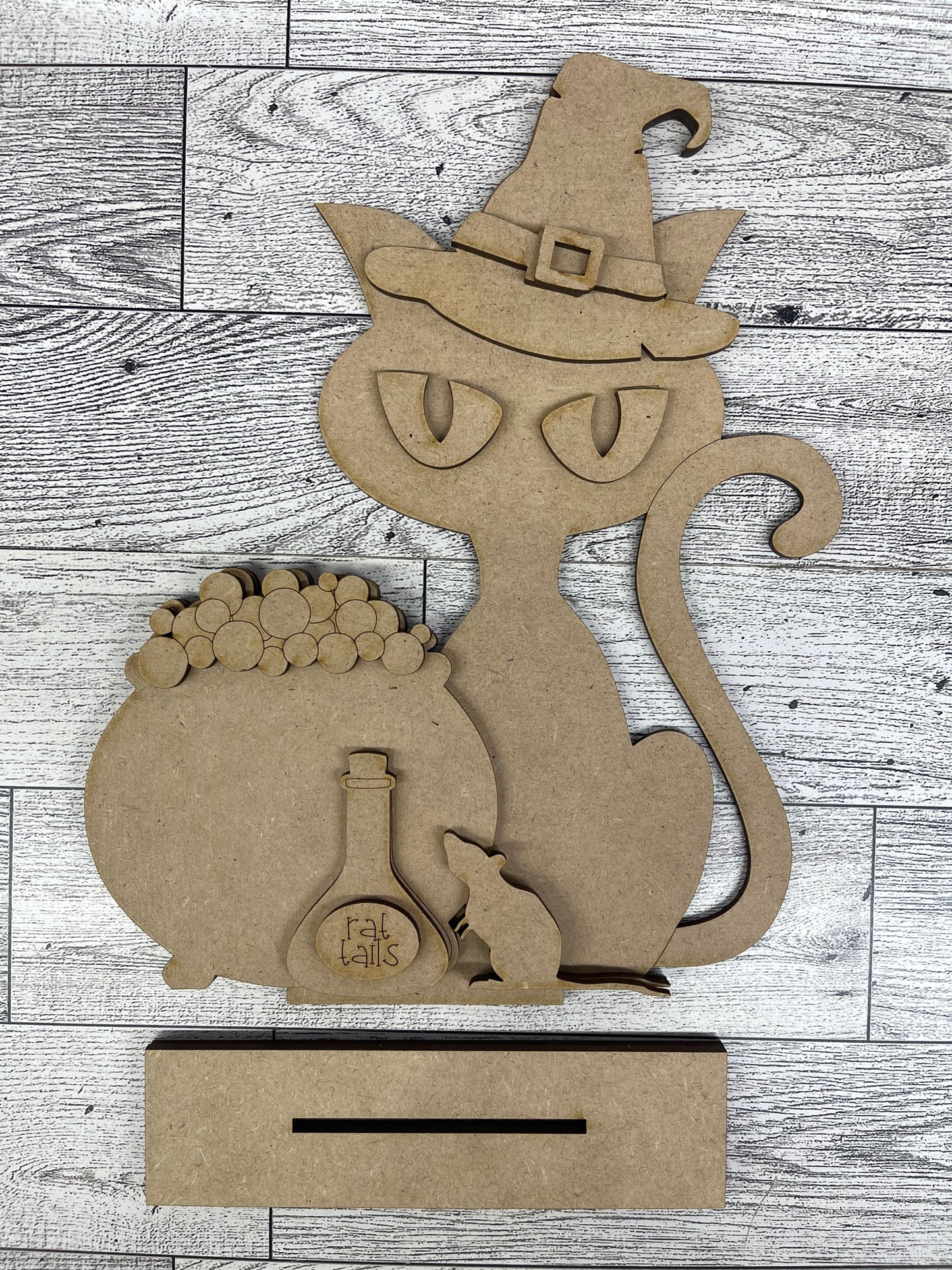 Halloween Cat Sitter hanging over shelf - unpainted wooden cutouts, ready for you to paint