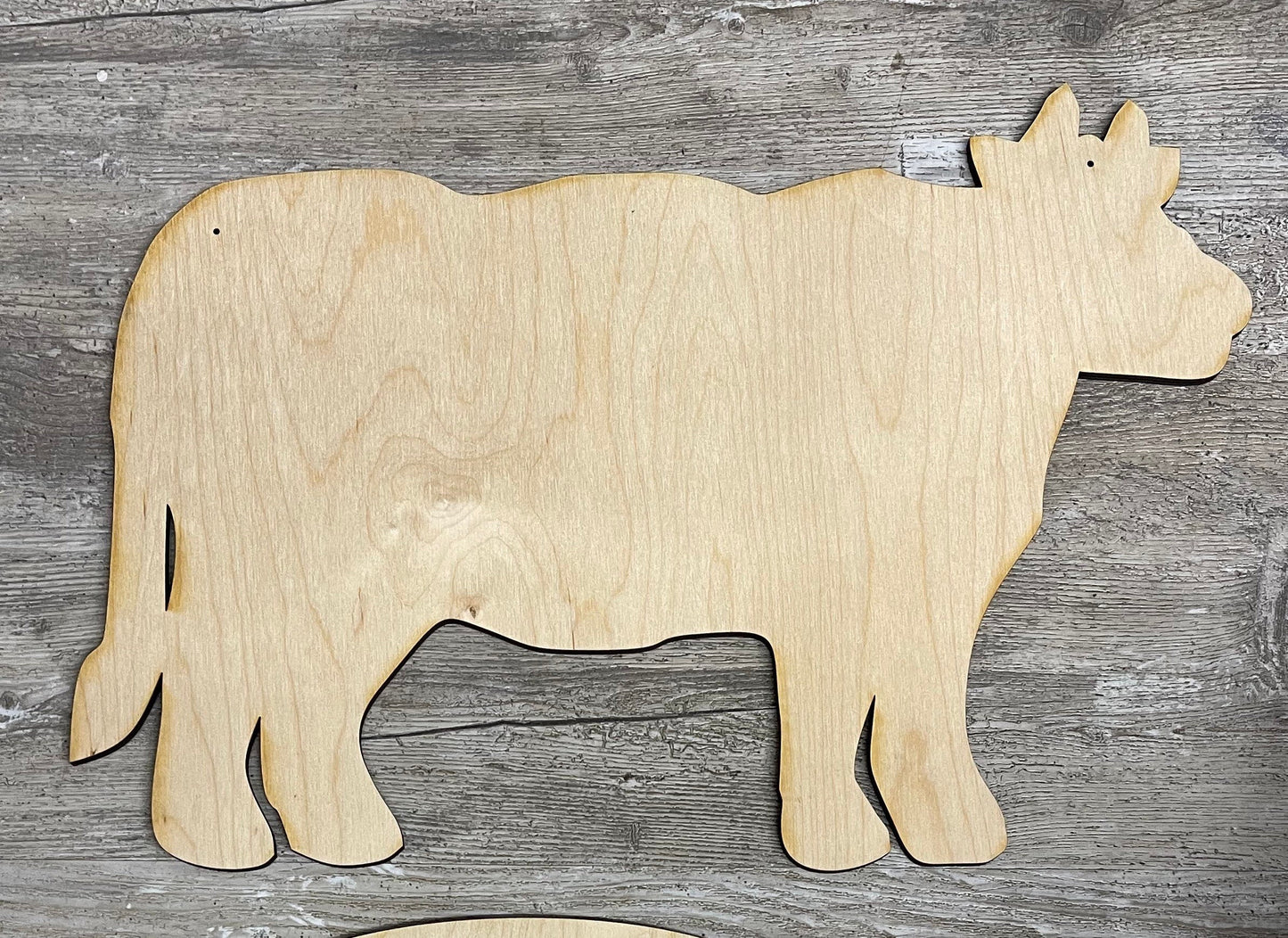 Unfinished wooden cow cutout