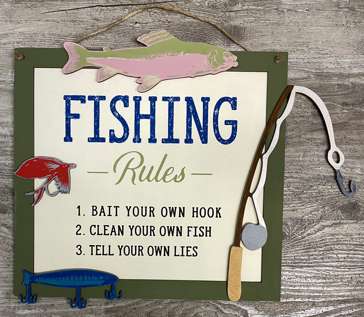 Fishing sign and cutouts, unpainted wooden cutouts